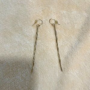 Beautiful long silver twist earrings